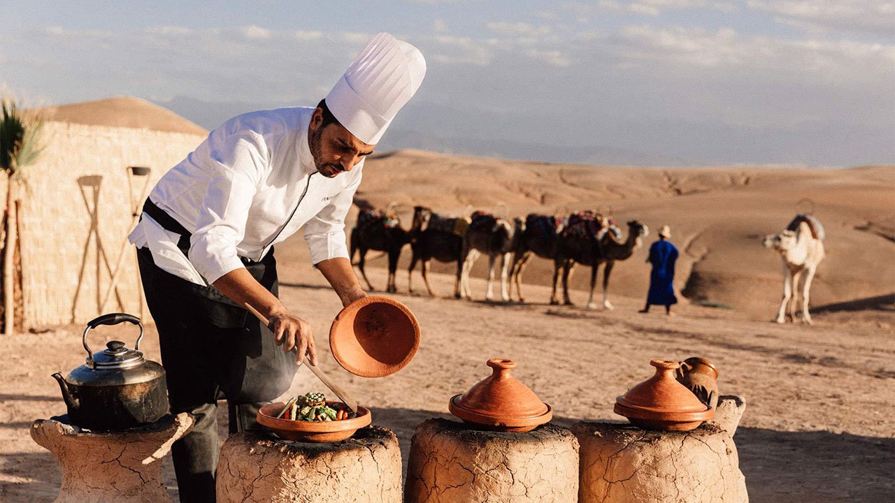 Chef cooking in a desert